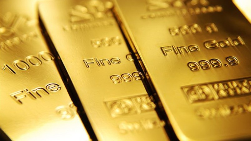 الذهب يربح 21 دولاراً