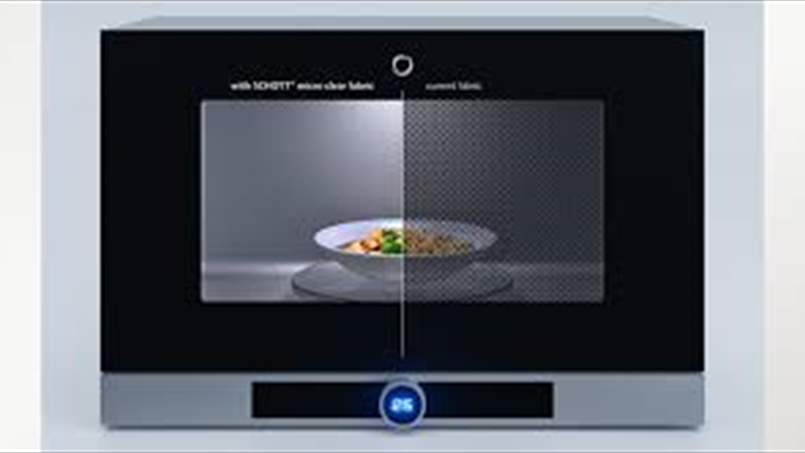 لماذا يحتوي باب الميكروويف على شبكة من النقاط السوداء؟